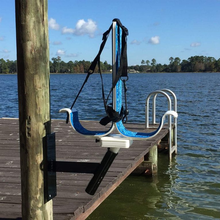 Dock-Wall-Mounts-for-S1,-S2,-&-L2K-photo1 Image of black dock/wall mounts for Manta Racks, and blue Manta Racks rack on a dock.