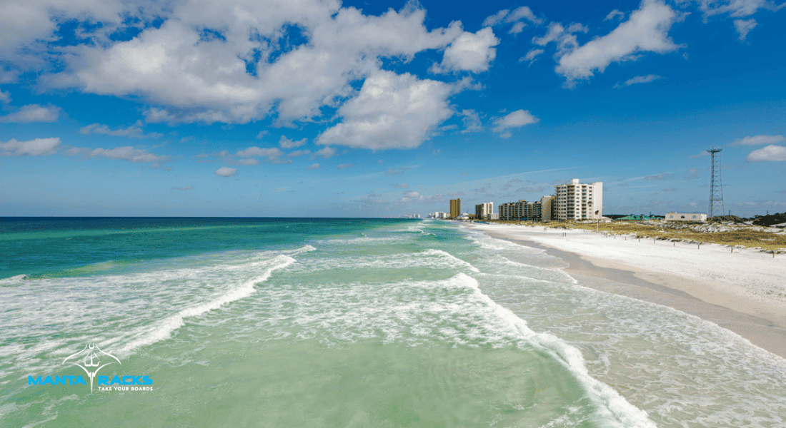 Image of Florida coastline with buildings in the distance.