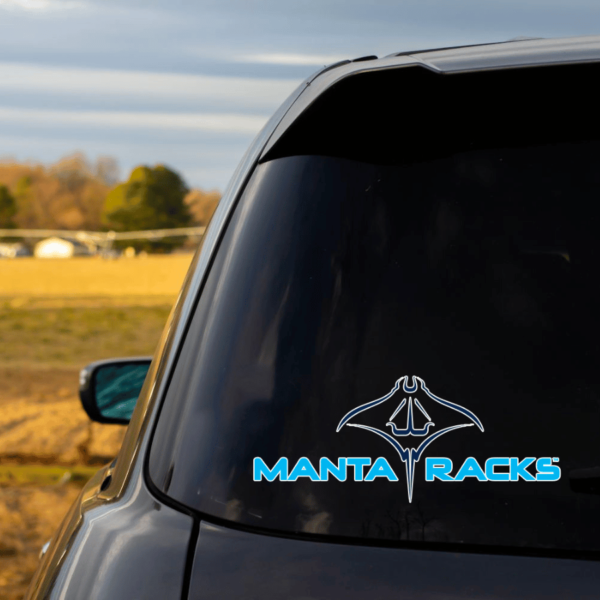 Image of Manta Racks logo on the back of a SUV.